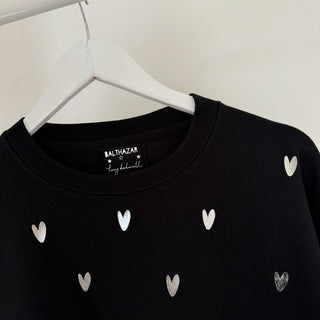 Glitter silver miniature HEARTS on black sweatshirt