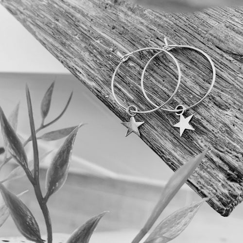 Gold star silver hoop earrings