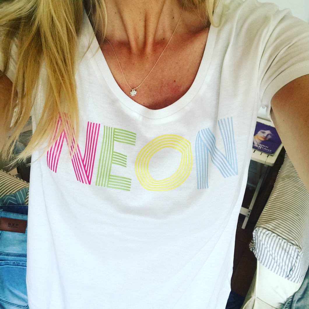 NEON on white tee (L)