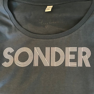 Pink SONDER on charcoal blue tee