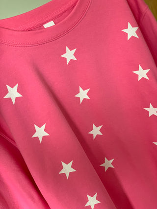 Little white stars on bright pink sweatshirt (medium, uk 12-14)